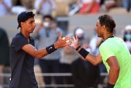 Rafael Nadal shakes hands with Alexei Popyrin after their first round match